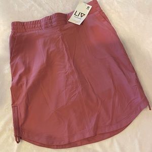 NWT LIV Outdoor skirt, size medium, rose color